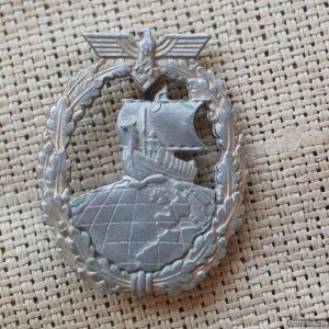 SMGL-2501 Reproduction Auxilary Cruiser KM Badge