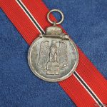 SMGQ-0009 Ost Medal 127 marked by Moriz Hausch AG