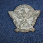 SMGQ-0064 Day of the Police 1942 pin