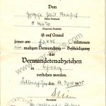 SMGQ-0162 April 1945 Dated BlackWound badge document