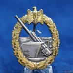 Coastal Artillery Badge in tombak by Schwerin