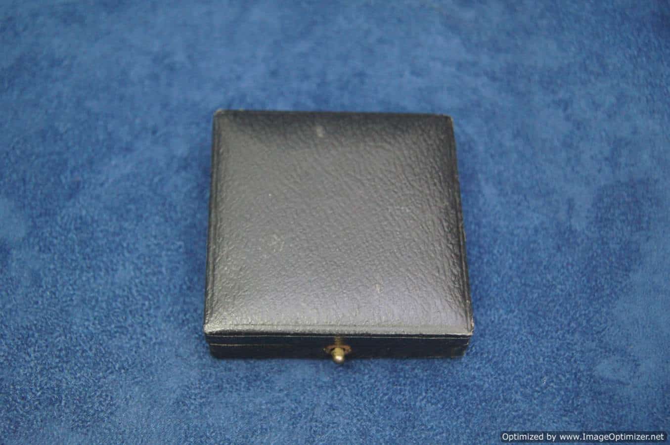 Silver wound badge case