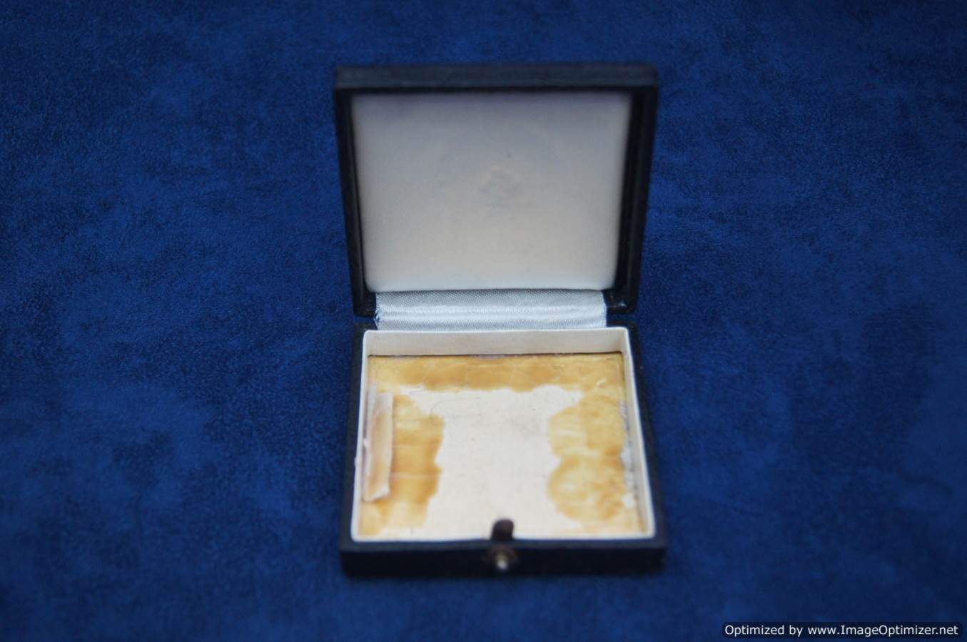 Silver wound badge case