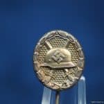 Silver wound badge stick pin by B&N L