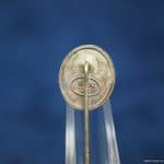 Silver wound badge stick pin by B&N L