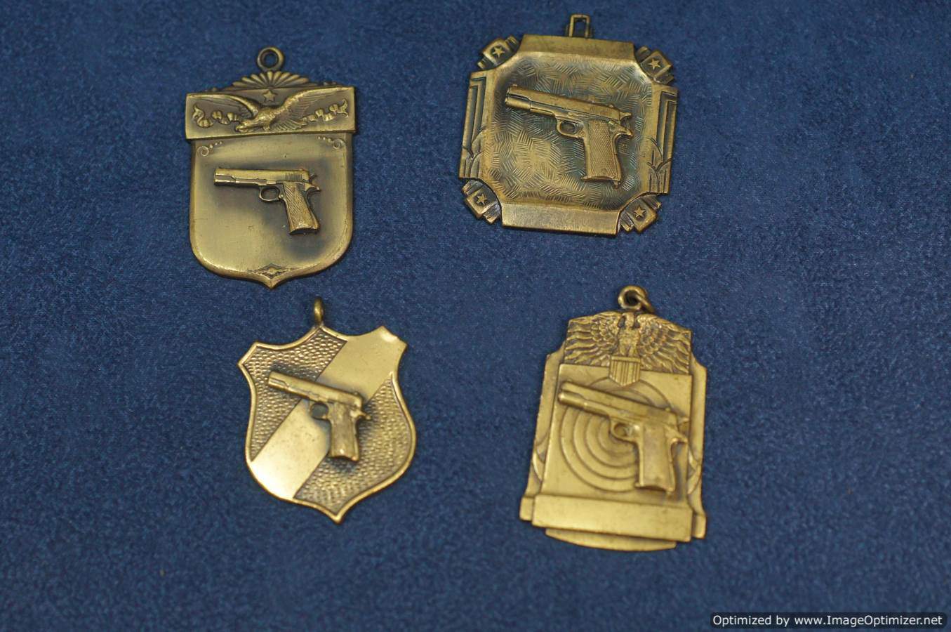 4pc Set of pistol badges by Blackinton