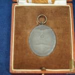 West Wall medal with post war case