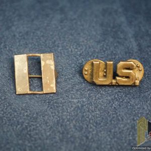 Silver marked Captain bars and Silver US Lapel insignia