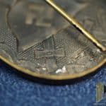 Early Black wound badge w/broken catch