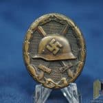 Black Wound badge in tombac