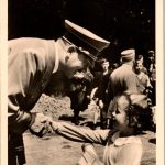 Hitler with little girl postcard