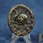 Black Wound badge in Tombak
