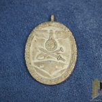 west wall Medal
