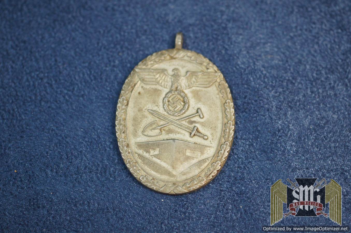 west wall Medal