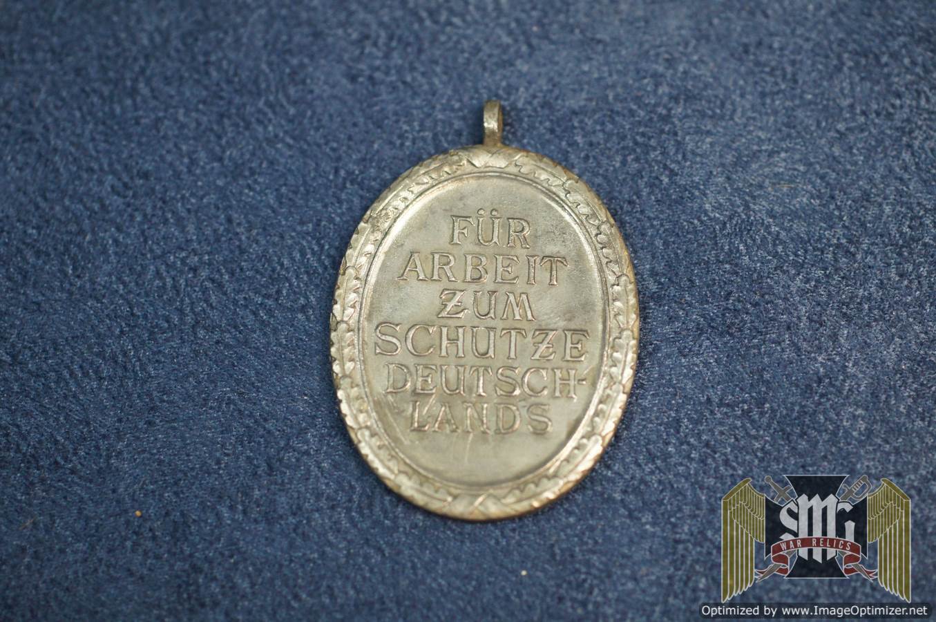 west wall Medal