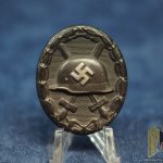 Black wound Badge Marked "4"