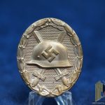 WOUND BADGE IN SILVER BY S&L Marked "4" on pin