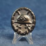 SMGM-3428 Black wound Badge By Carl Wild Marked 107