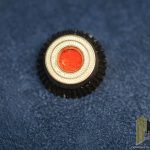 Metal cockade