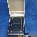 Numbered and Cased WW2 era purple heart by Rex Products with Hospital Extract