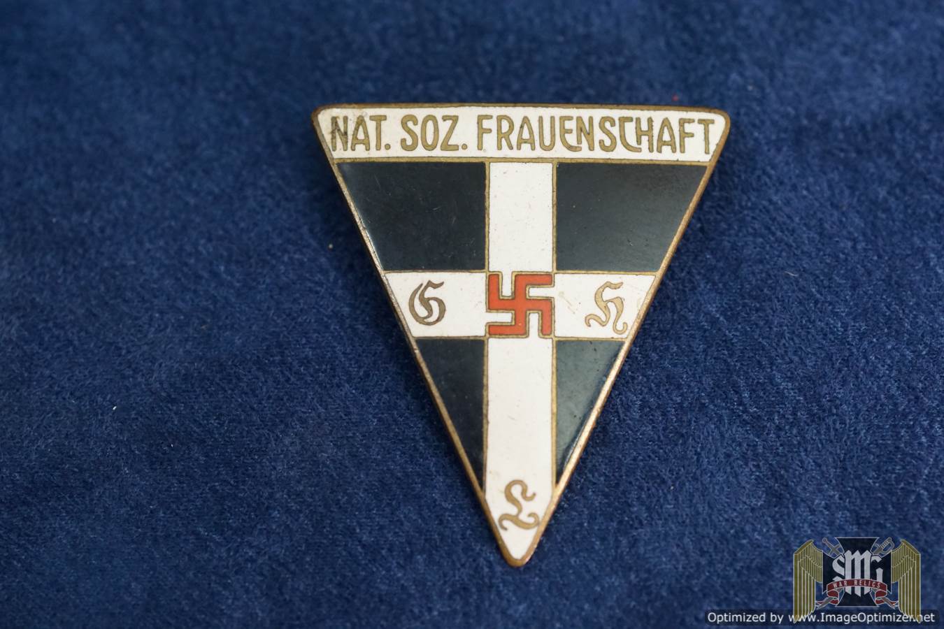 This is the larger and harder to find type. Minor wear to the enamel. Impressive in hand. 