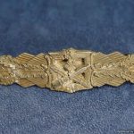 Damaged Close Combat clasp