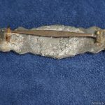 Damaged Close Combat clasp