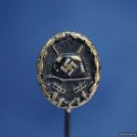 Black wound badge Stick pin in tombak 16x13mm