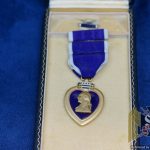 Numbered WW2 Purple heart with Extract for PFC David D. Strang