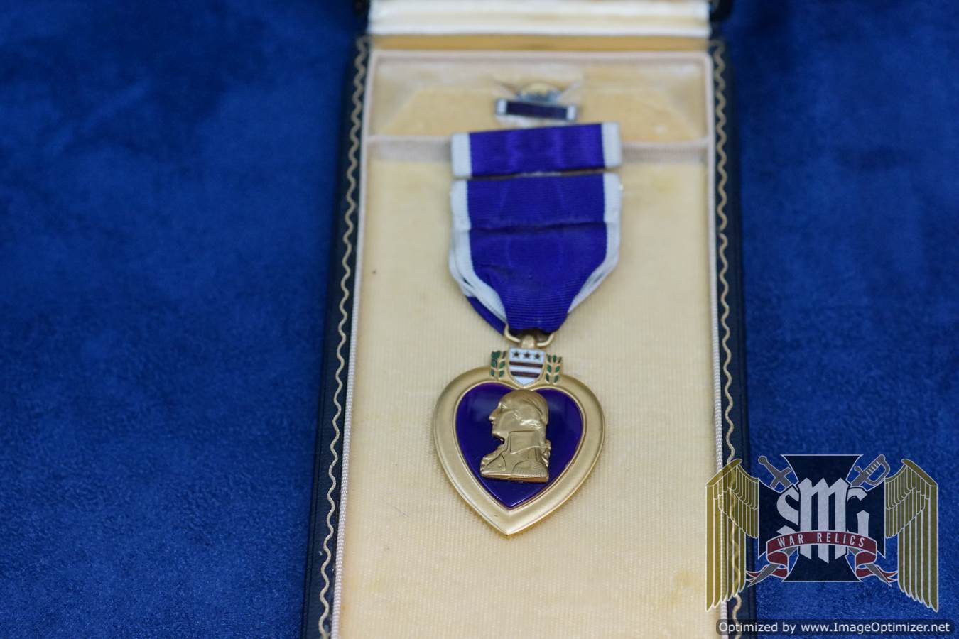 Numbered WW2 Purple heart with Extract for PFC David D. Strang