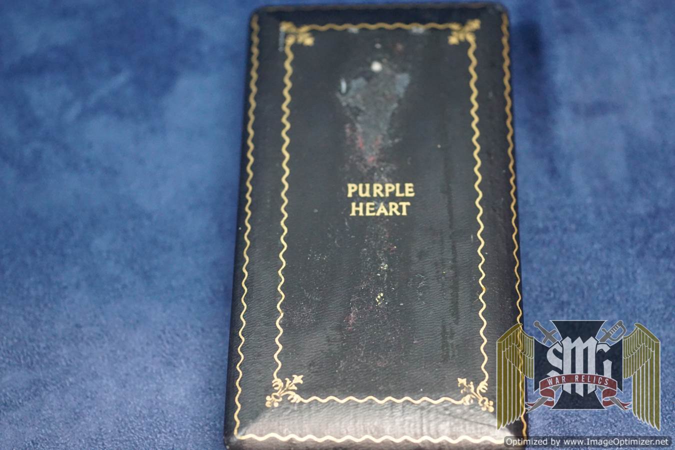 Numbered WW2 Purple heart with Extract for PFC David D. Strang