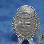 Gau Ost Hannover Post war solid back badge by Souval