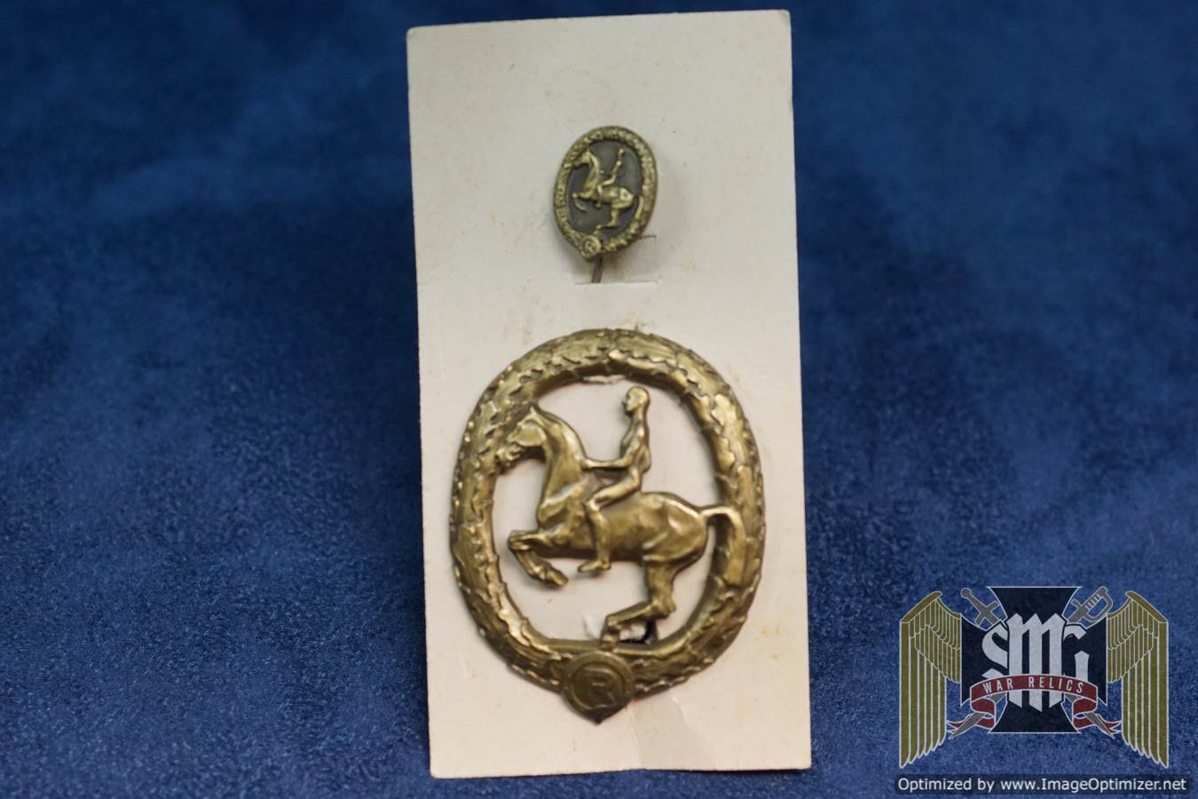 Horsemans Badge in Bronze with stickpin on sales card