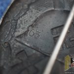 Black wound Badge Maker marked 65