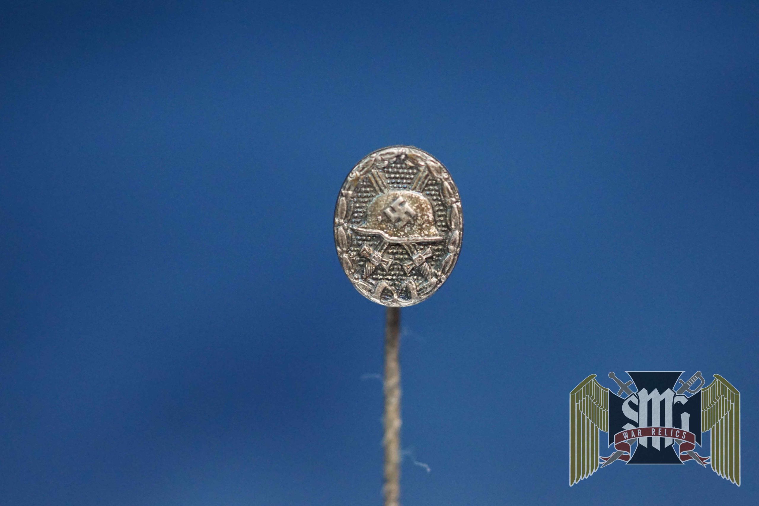 Silver wound badge stick pin 7x9mm L/52 marked