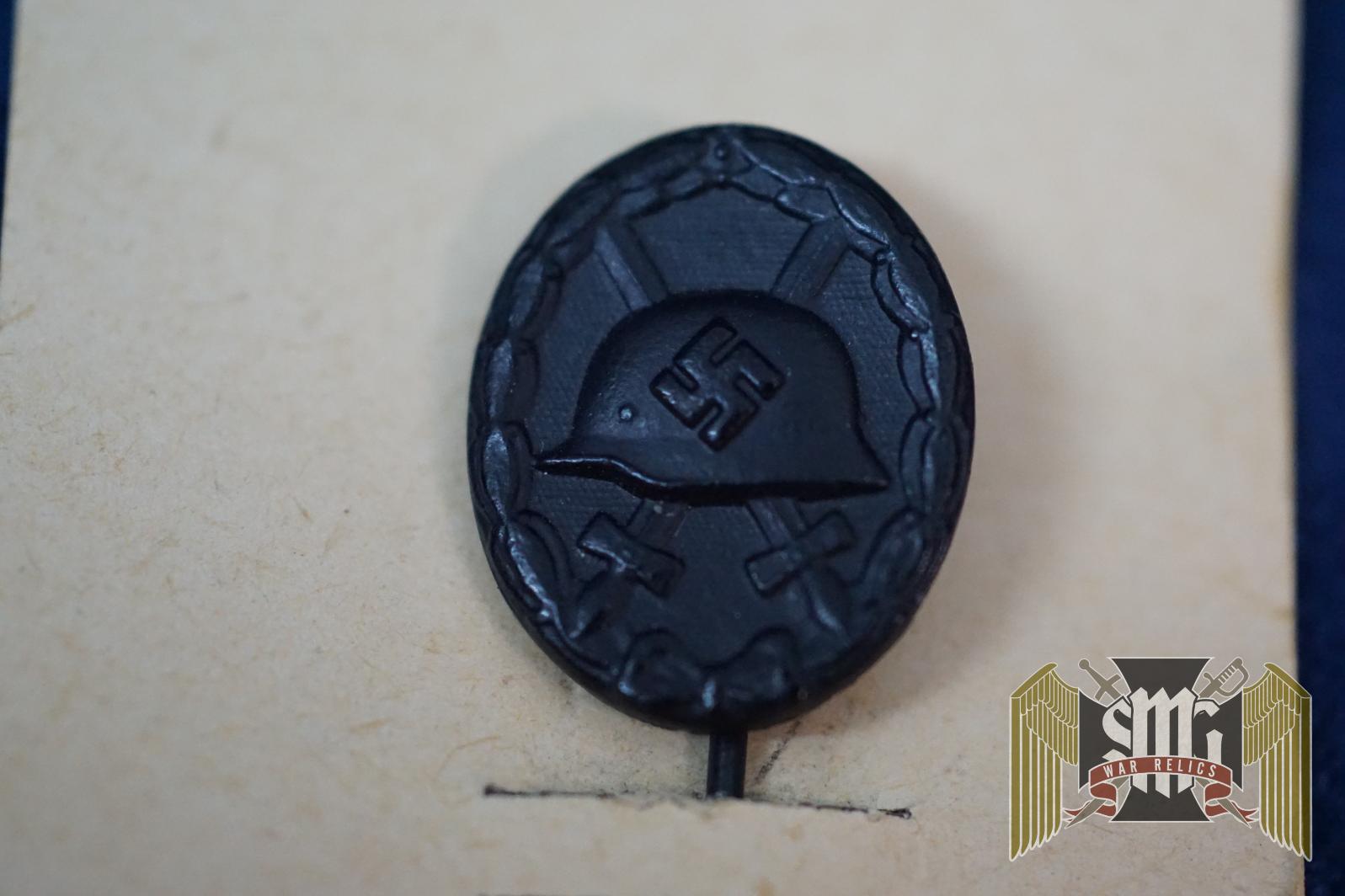 Black Wound Badge Stick pin w/ LDO Sales board