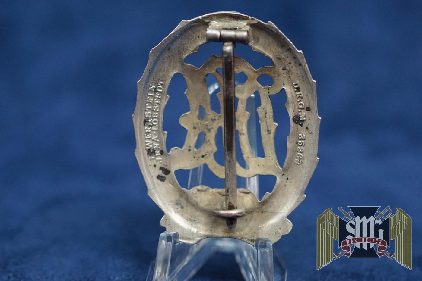 DRA Sports badge in Silver