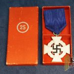 Cased 25 year faithful Service cross by Roman Palme