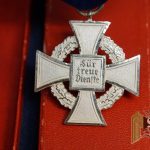 Cased 25 year faithful Service cross by Roman Palme