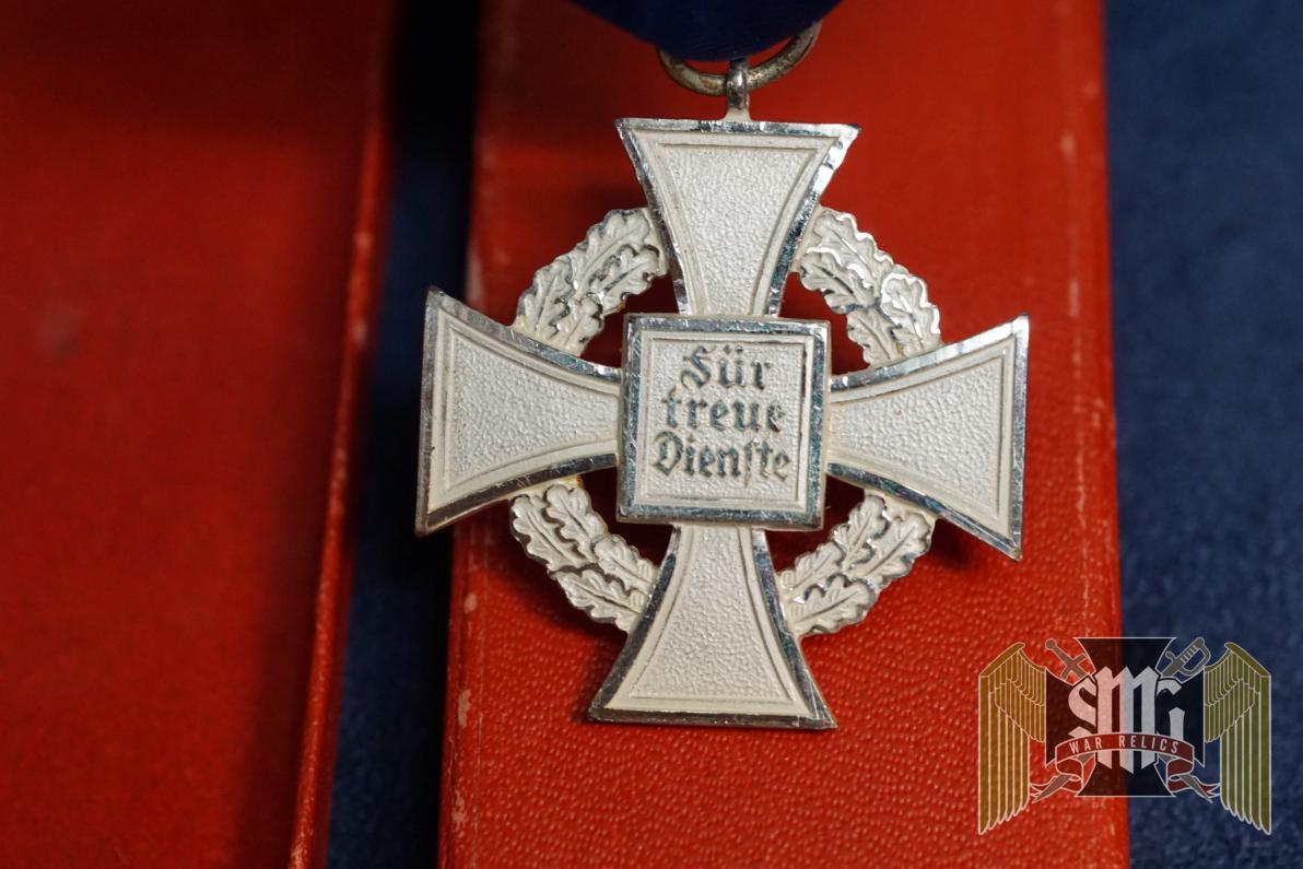 Cased 25 year faithful Service cross by Roman Palme