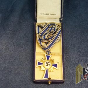 Cased Mother's cross in Gold by Hauschild