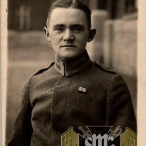 WW1 Postcard, uniform study Black wound badge