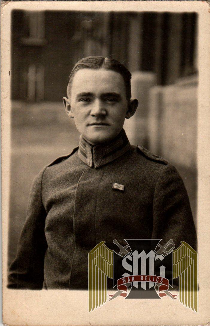 WW1 Postcard, uniform study Black wound badge