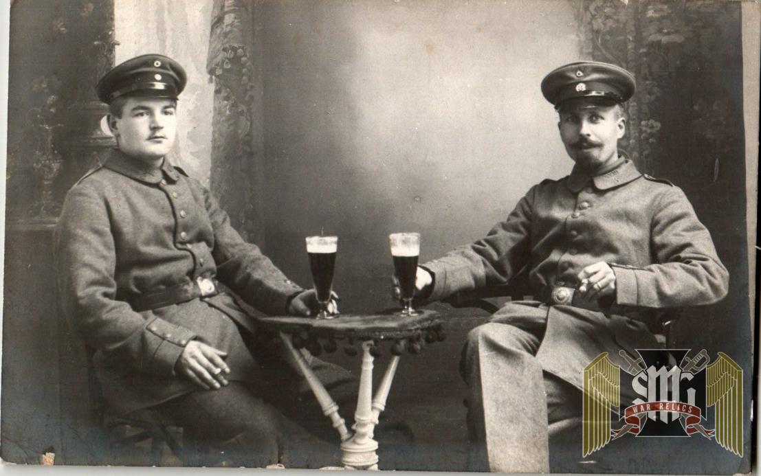 WW1 German Postcard, uniform study Smokin & Drinking