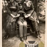 WW1 Postcard soldier w/ two ladies