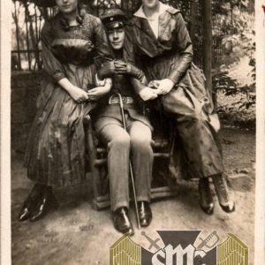 WW1 Postcard soldier w/ two ladies