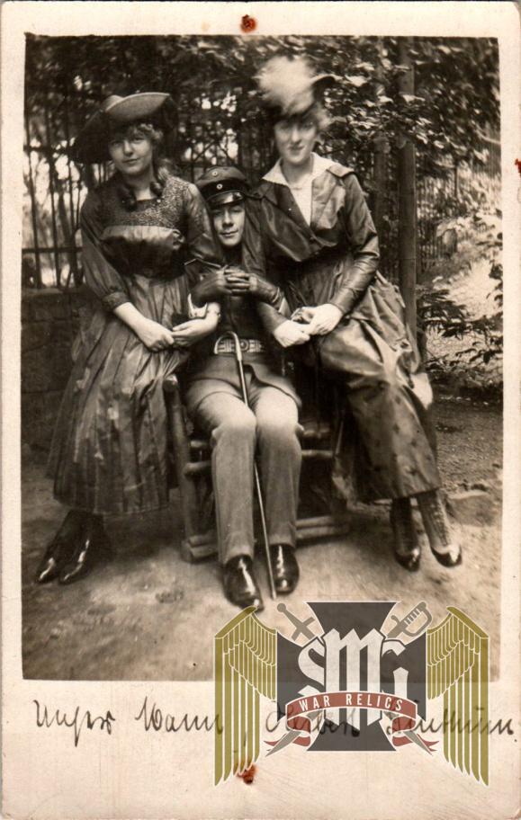 WW1 Postcard soldier w/ two ladies