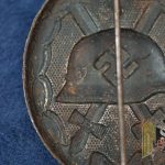 Black Wound badge by Robert Kreisel marked 67