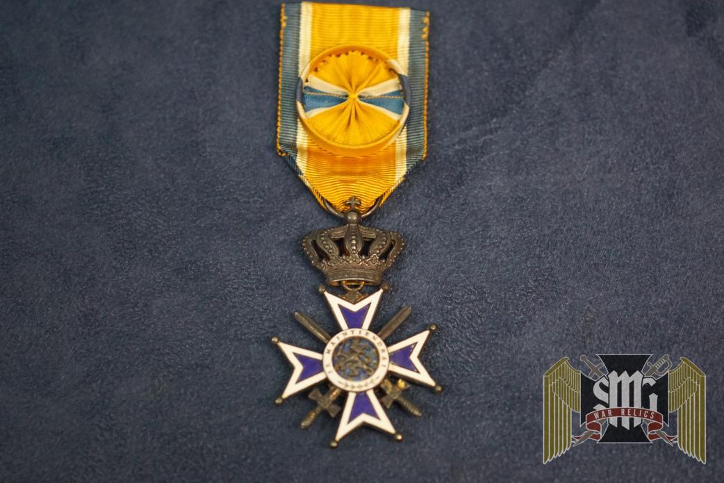 The Croix de guerre (French) or Oorlogskruis (Dutch) is a military decoration of the Kingdom of Belgium established by royal decree on 25 October 1915.[1] It was primarily awarded for bravery or other military virtue on the battlefield. The award was reestablished on 20 July 1940 by the Belgian government in exile for recognition of bravery and military virtue during World War II.[2] The post-1940 decoration could also be awarded to units that were cited. The decoration was again reestablished by royal decree on 3 April 1954 for award during future conflicts.[3] World War I Reverse of the WW1 Croix de guerre Award statute The World War I Croix de guerre was established by royal decree on 25 October 1915 as an award for bravery or other military virtue on the battlefield. It was only awarded to individuals. The Croix de guerre was not only awarded for bravery but also for three years or more of service on the front line, or for good conduct on the battlefield. It was also awarded to volunteers older than 40 or younger than 16 after a minimum of 18 months of service, to escaped prisoners of war rejoining the armed forces, and to military personnel who were placed on inactive duty because of injury.[1]