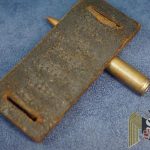 I'm selling this just how it was found. The bullet is a deactivated and swastika embellished. 